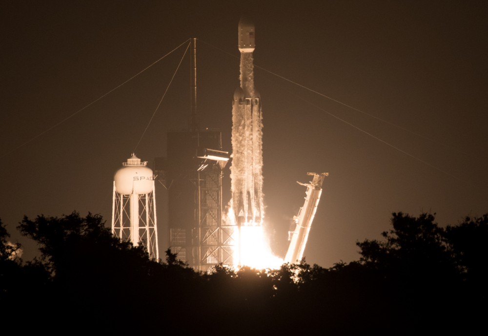 A SpaceX Falcon Heavy launching from Kennedy Space Center.